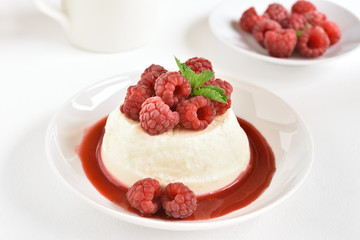 Panna cotta with fresh raspberries