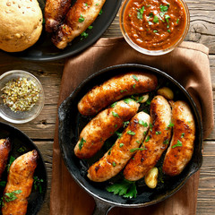Fried sausages in frying pan