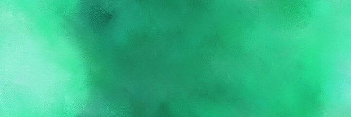 medium sea green and aqua marine color background with space for text or image. vintage texture, distressed old textured painted design. can be used as header or banner