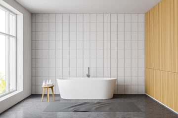 Fototapeta na wymiar White tile and wooden bathroom interior with tub