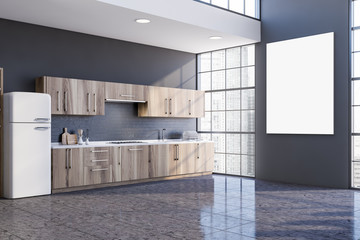 Gray kitchen corner with fridge and poster