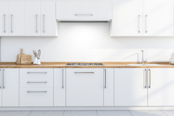 White kitchen countertops and cupboards