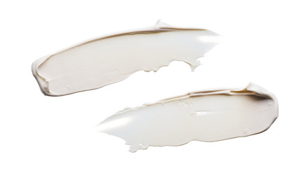 White smear and texture made by face clay or cream isolated on white background.