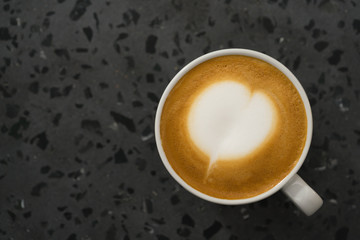 topv view of cappuccino on terrazzo surface with copy space