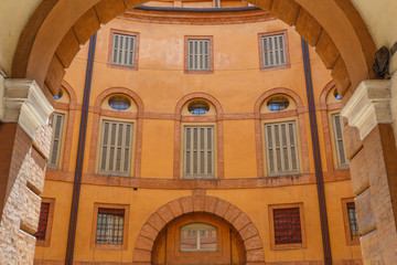 Medieval facade in the historic centre of Ferrara, Italy
