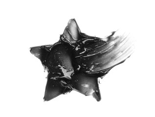 Brush strokes and texture of black detox facial mask or acrylic paint isolated on white background