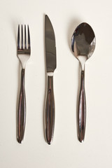 Kitchen knifes, spoons and forks. Cutlery