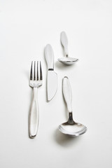 Kitchen knifes, spoons and forks. Cutlery