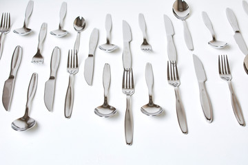 Kitchen knifes, spoons and forks. Cutlery
