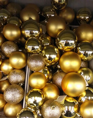 Golden Christmas Ball Ornaments. Shiny holiday background. 