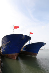 Wooden fishing boats moored on the shore