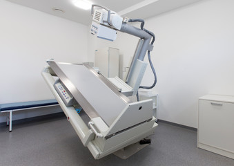 Interior of modern medical room with automatic X-ray equipment