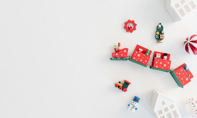 Fototapeta na wymiar top view of Christmas and new year holidays concept with Pine cones, gift box, Christmas ball and Christmas decorations on white table background.