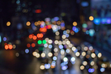 Abstract blurred colorful bokeh street lights bokeh for background.Traffic lights on the street.Defocusing abstrsct background.