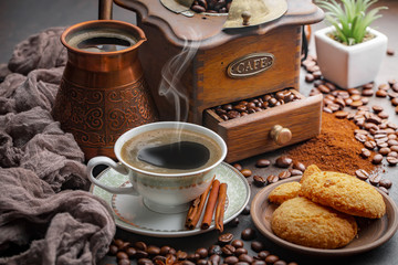Black coffee on an old background in a cup