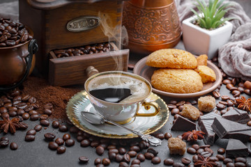 Black coffee on an old background in a cup