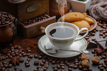 Black coffee on an old background in a cup