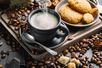 Black coffee on an old background in a cup