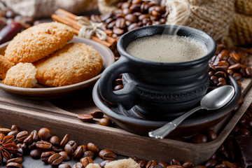 Black coffee on an old background in a cup