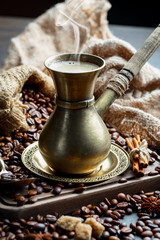 Black coffee on an old background in a cup