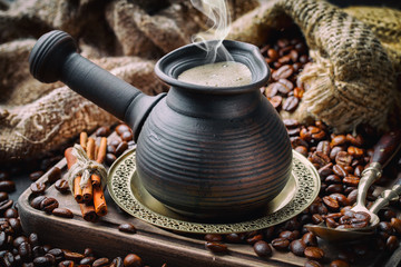 Black coffee on an old background in a cup