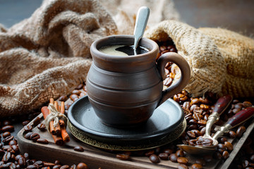 Black coffee on an old background in a cup