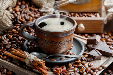 Black coffee on an old background in a cup