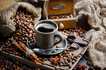 Black coffee on an old background in a cup