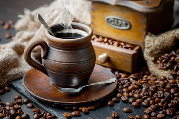Black coffee on an old background in a cup