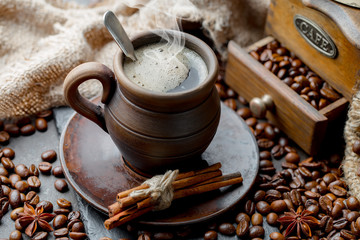 Black coffee on an old background in a cup