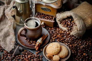 Black coffee on an old background in a cup