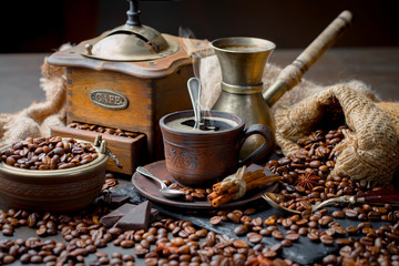 Black coffee on an old background in a cup
