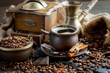 Black coffee on an old background in a cup