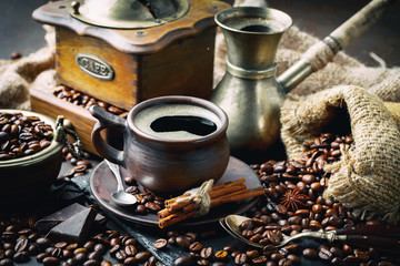 Black coffee on an old background in a cup