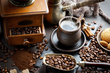 Black coffee on an old background in a cup