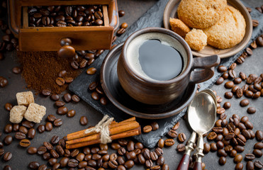 Black coffee on an old background in a cup