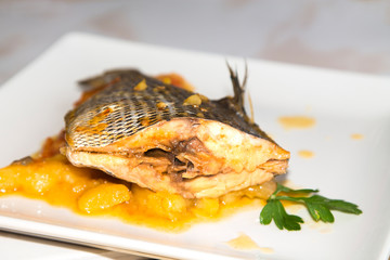 stewed fish dish with potatoes and peppers