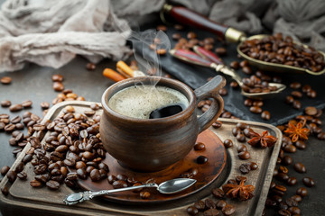 Black coffee on an old background in a cup