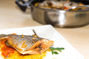 Stewed fish with potatoes and peppers