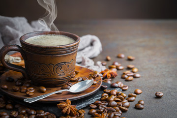 Black coffee on an old background in a cup