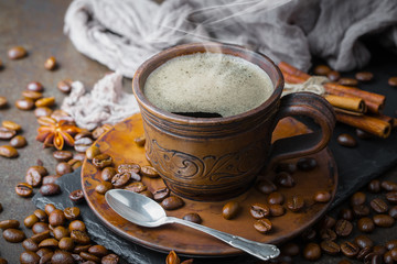 Black coffee on an old background in a cup