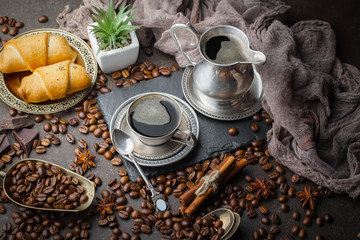 Black coffee on an old background in a cup