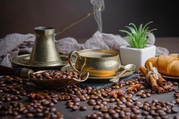 Black coffee on an old background in a cup