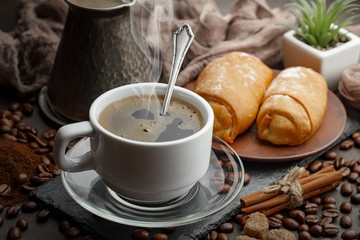 Black coffee on an old background in a cup