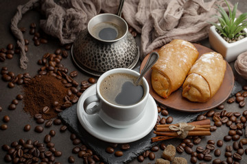 Black coffee on an old background in a cup