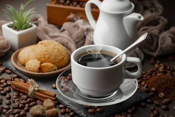 Black coffee on an old background in a cup