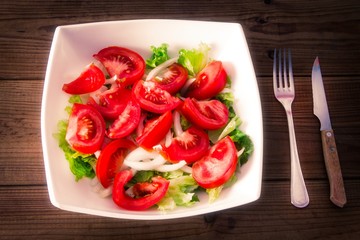 lettuce, tomato and onion salad diet and health concept