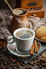 Black coffee on an old background in a cup