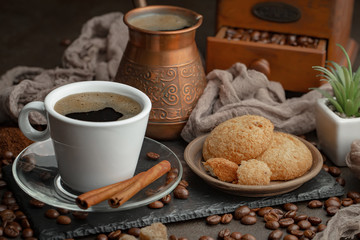 Black coffee on an old background in a cup