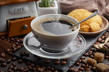 Black coffee on an old background in a cup